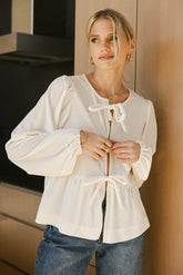 Lucie Peplum Tie Blouse in Cream