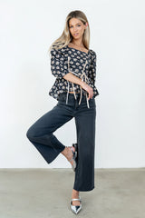 Jerzey Floral Peplum Blouse in Black
