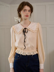Jolie Doll Collar Contrasting Lace-up Pleated Blouse