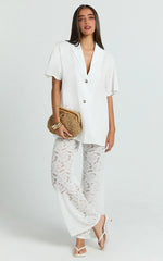 White Two-Piece Set: Relaxed Shirt and Lace Pants