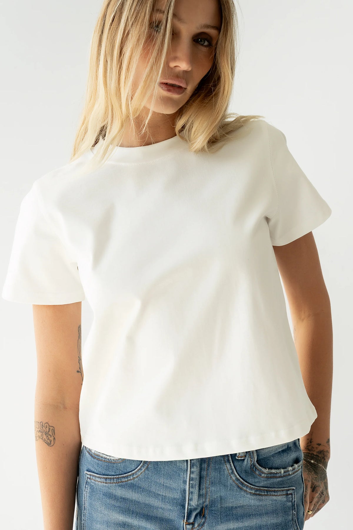 Judy Tee in White